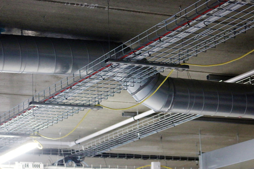 Zip-Clip Con-Lock system used with Strut-Lock trapeze to suspend cable basket